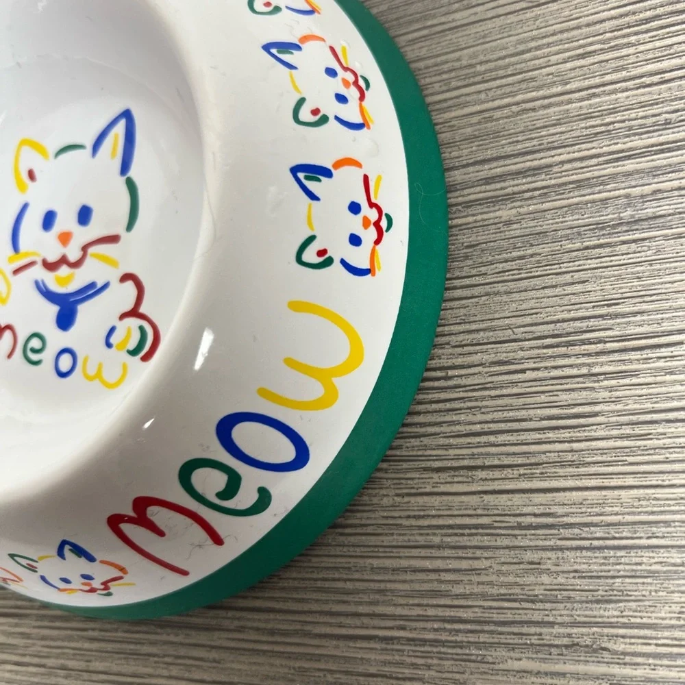 Colorful ceramic cat food dish